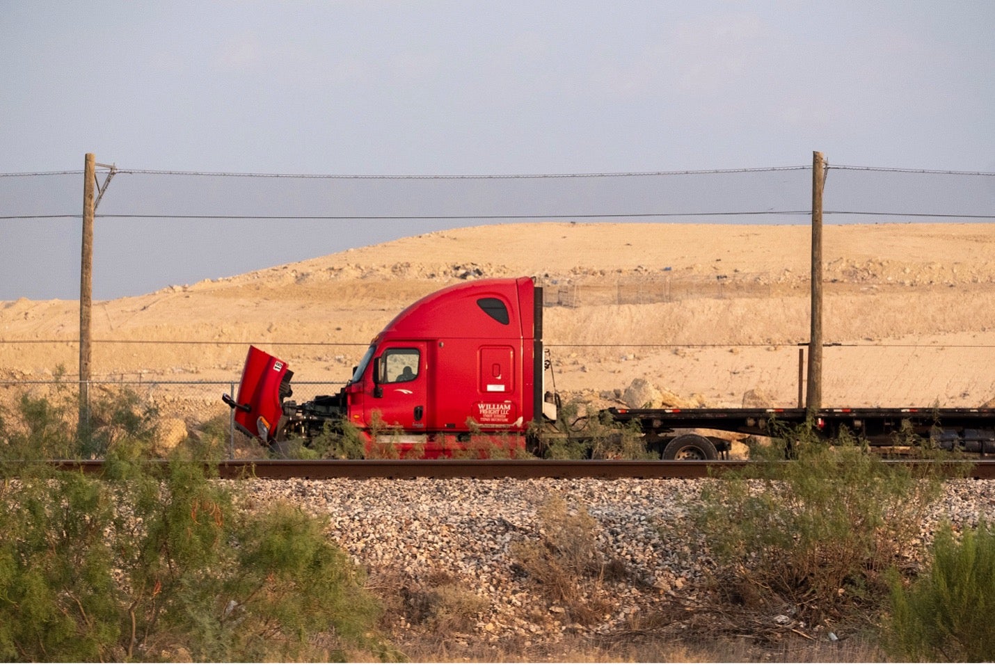 Jason Reed and Barry Stone, "Red Truck" from "Boom and Dust," 2025.