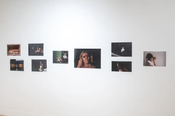 gallery image of photo graphs hung on a single wall