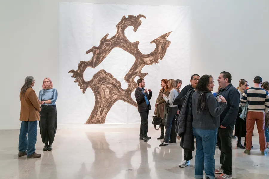 people in gallery during art opening