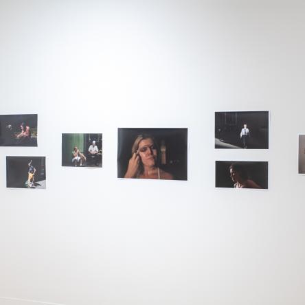 gallery image of photo graphs hung on a single wall
