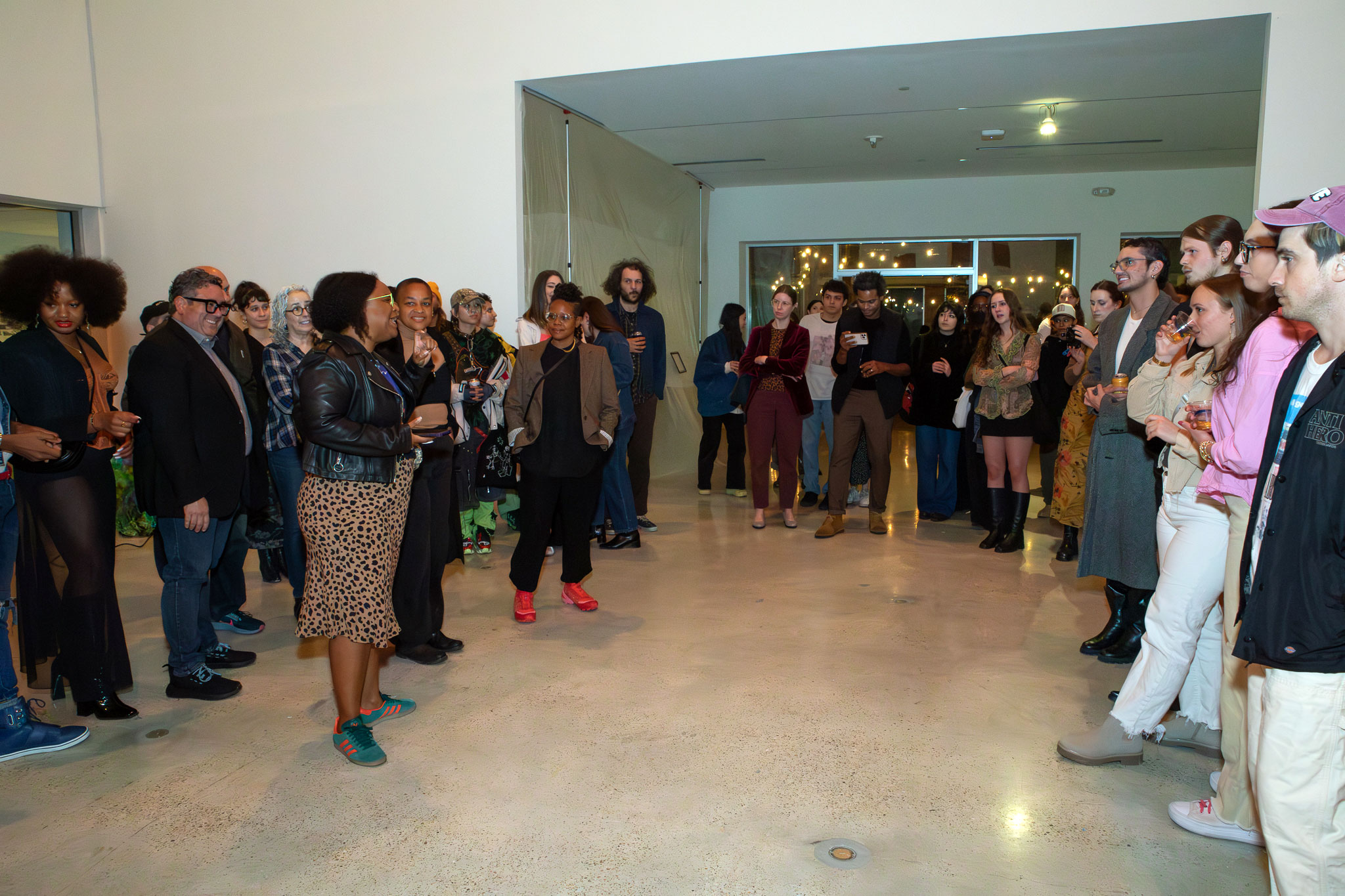 people in gallery during artist-led tour of exhibition