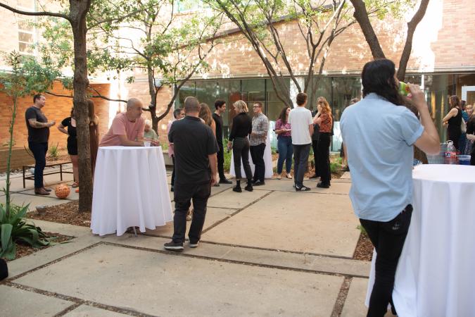 people outside at art gallery opening