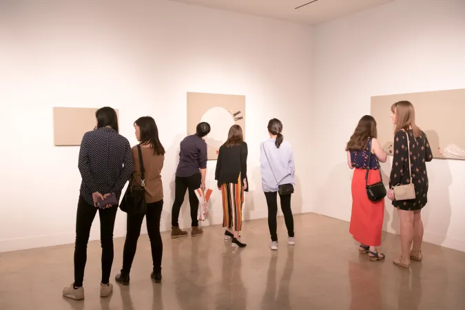people at art gallery opening