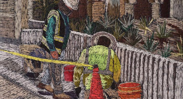 embroidered artwork that portrays utility workers at a manhole in street