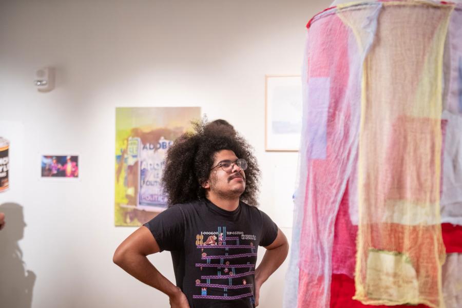 person viewing artwork in gallery